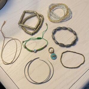 Lot of jewelry. Anklet or wrist bracelet, hoops earrings, charm. Mix or match